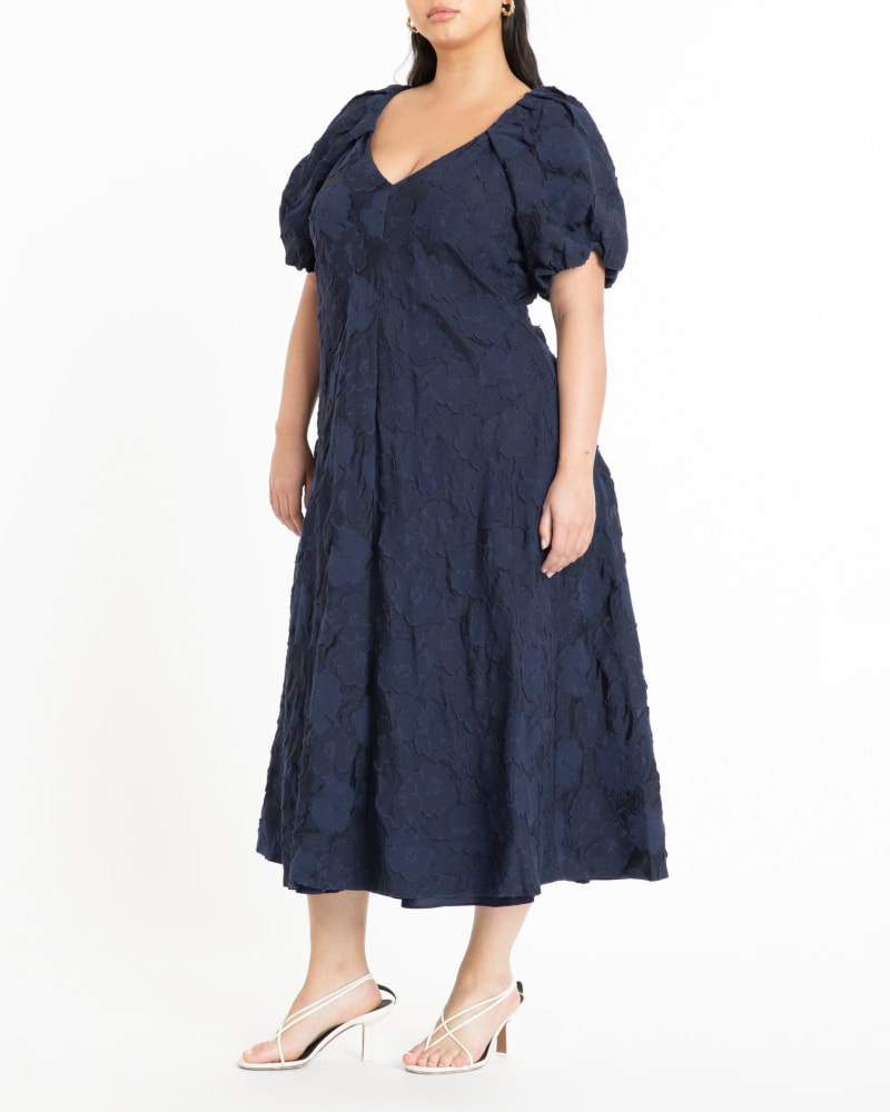 Front of a model wearing a size 16 Harley Dress in NAVY by Tanya Taylor. | dia_product_style_image_id:283320